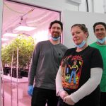 Left to right: Prairie Trichomes co-founder Adam Carritt, quality assurance and horticulturalist Rebecca Sokol, master grower Jamie Snow stand outside of one of their growing rooms.