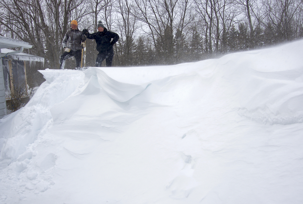 A wind-exposed property near Altamont, Man., faces heavy snowdrifts following a blizzard April 13-14 that dropped over a half a metre of snow on the area.