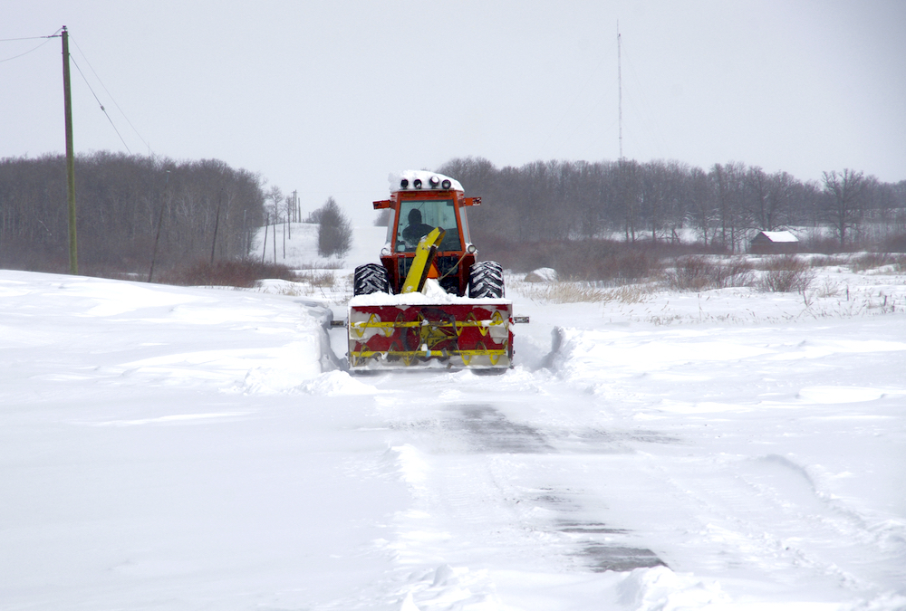 Heavy snow accumulations blocked rural roads in Manitoba following a major blizzard April 13-14.