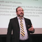 Cam Dahl speaks at the Manitoba Pork Council annual meeting in Winnipeg, April 6.