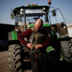 Yuri, a Ukrainian farmer, wears his body armour while preparing to work in a field on April 26, 2022 in the country’s southern Zaporizhzhia region. (Photo: Reuters/Ueslei Marcelino)
