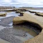 Flood waters leave extensive damage to PR 240, just below the Manitoba escarpment, May 2 after the third Colorado low to hit the region in as many weeks.
