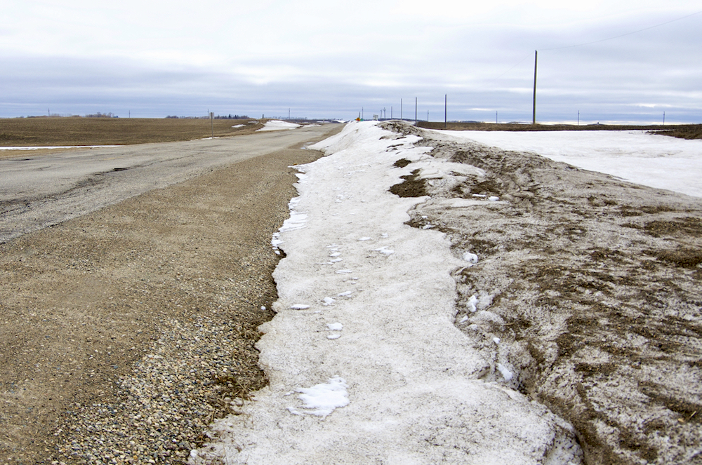 Ditches near Notre Dame de Lourdes remain packed with snow as flood waters hit communities below the Manitoba escarpment.