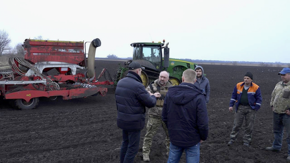 Ukrainian farmers and soldiers meet in the liberated fields of northern Ukraine.