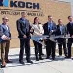 Koch Fertilizer Canada executives cut the ribbon on their Brandon headquarters May 4, along with Manitoba Premier Heather Stefanson (centre).