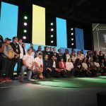 All of the participating teams and judges pose on stage after the competition. Photo: Liam O’Connor
