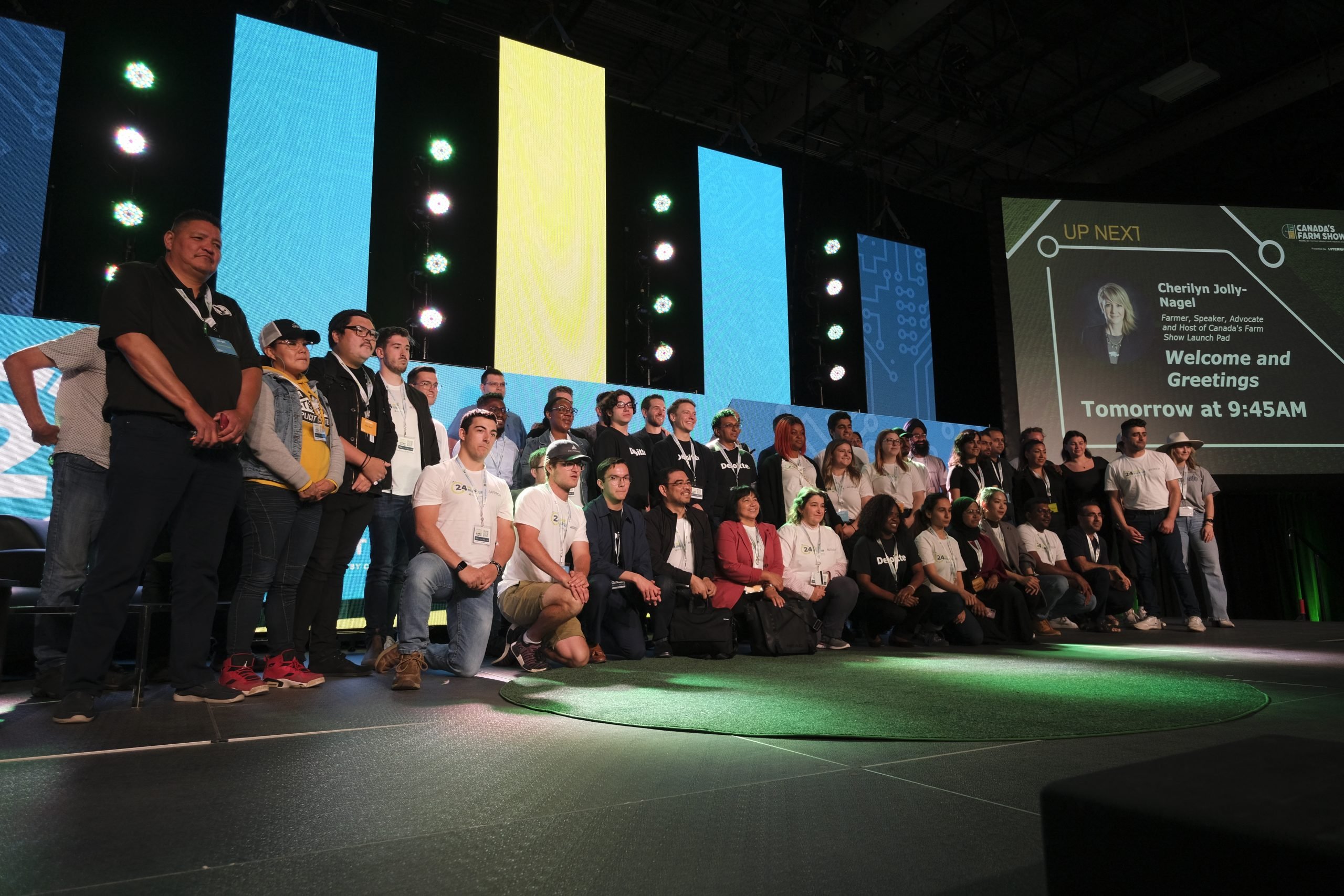 All of the participating teams and judges pose on stage after the competition. Photo: Liam O’Connor

