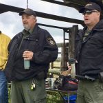 Local conservation officers speak during a field day hosted by the pilot project on June 21.