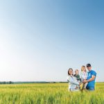 Crop prices need to stay high for farmers to recoup the record- breaking cost of this year’s crop, says Brent Konstapel (pictured with wife Megan and their
children Allison and Whitney).