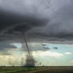 A funnel cloud all by itself is not considered a tornado.