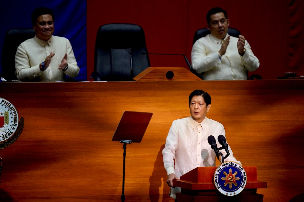 Philippine President Ferdinand Marcos Jr. speaks as Senate President Juan Miguel Zubiri and House Speaker Martin Romualdez applaud during his first State of the Nation Address, in Quezon City, Metro Manila, Philippines, July 25, 2022.  Photo: Aaron Favila/Pool via Reuters

