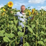 Ihor, a farmer in central Ukraine, poses in his sunflower field. The plant has become one of the symbols of the war-torn country.