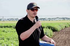 Zachary Frederick presents his phosphorus acid phototoxicity trial at the Canada-Manitoba Crop Diversification Centre field day in early August.