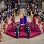 Scottish Secretary Alister Jack and Secretary of State for Defence Ben Wallace in ceremonial role as members of the Royal Company of Archers guard the coffin of Queen Elizabeth II, draped in the Royal Standard with the Imperial State Crown and the Sovereign's orb and sceptre, lying in state on the catafalque in Westminster Hall, at the Palace of Westminster, London, ahead of the Queen's funeral on Sept. 19.
