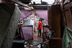 A man stands inside his destroyed house in the rural zone of Cuey, in the aftermath of Hurricane Fiona, in El Seibo in the Dominican Republic on Sept. 20, 2022. (Photo: Reuters/Ricardo Rojas)

