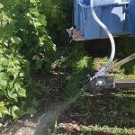 At the Quebec site, a sandblasting unit was rigged up to the side of a tractor.