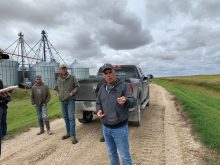 Steve Sager explains the drainage project on Les Felsch’s farm.