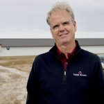 Topigs Norsvin Canada general manager Cam McGavin stands outside the incoming Innova Canada site in western Manitoba.