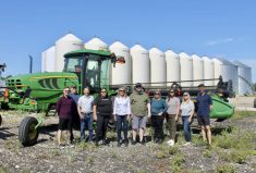 EMILI staff meet with Rick Rutherford on an EMILI staff visit to Innovation Farms site this summer.
