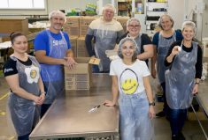 Manitoba Egg Farmers members and staff during an October visit to Manitoba Harvest to pack eggs for distribution to families.