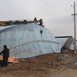 Farmers build a greenhouse for winter warm vegetables in Binzhou, East China’s Shandong province, on Nov. 29.