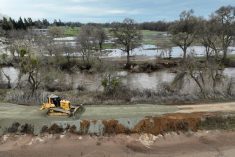 A drone&#8217;s-eye view of crews repairing a levee, north of the Cosumnes River, after it was breached by heavy rains and flooded Sacramento County roads and properties near Wilton, just southeast of Sacramento, on Jan. 2, 2023. (Photo: Reuters/Fred Greaves)
