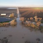 Flooding from the Salinas River forces the closure of a road at Salinas, California on Jan. 12, 2023. (Photo: Reuters/Nathan Frandino)
