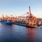 The president of Quorum Corporation is concerned about a bottleneck of grain-shipping vessels on the West Coast.