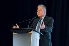 Stephen Poloz, an economist and former governor of the Bank of Canada, speaks during CropConnect in Winnipeg on February 15.
