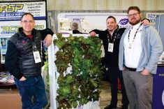 (Left to right) Rick Langille, William Aitken and Scott Hyndman of Harvest Today pose in their
Ag Days booth in January.