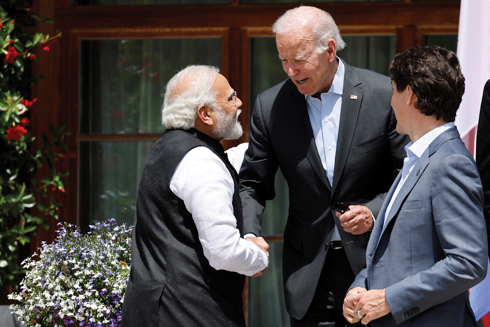 India’s Prime Minister Narendra Modi shakes hands with U.S. President Joe Biden next to Canada’s Prime Minister Justin Trudeau during a G-7 meeting in the summer of 2022. Canada and the U.S. are beginning to talk about Indo-Pacific issues.