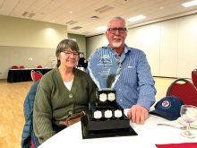 Lori and Len Koop accept the 2023 Bill Lenton Memorial Award in Brandon in February.