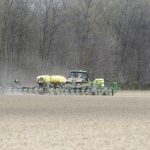 Farmer Steve Timmer plants corn near Shelby in Richland County, Ohio, about 110 km north of Columbus,  on April 19.