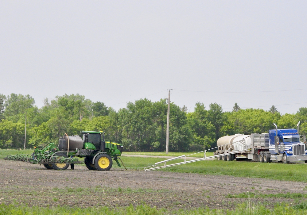 Sprayers get to work in the RM of Thompson in south-central Manitoba in mid-June.