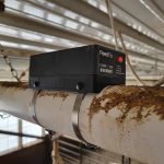 The FeedFlo sensor in a hog barn setting.