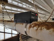 The FeedFlo sensor in a hog barn setting.
