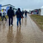 A rainy day on July 18, 2023 at the Ag in Motion outdoor farm show at Langham, Sask., west of Saskatoon. (Ag in Motion via Twitter)
