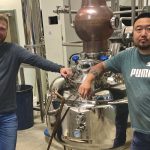 Master distiller Jason Kang (right) of Capital K Distillery stands with partner and production manager Matt Patterson at their Winnipeg location.