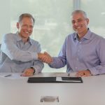 Rob Painter (l) and Eric Hansotia, CEOs of Trimble and Agco respectively, agreed on Sept. 28, 2023 to combine their precision ag arms into a new joint venture. (Trimble via PRNewswire)
