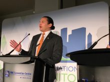 Wab Kinew, premier-designate after his party’s Oct. 3 victory, speaks at the Association of Manitoba Municipalities leaders’ debate in April.