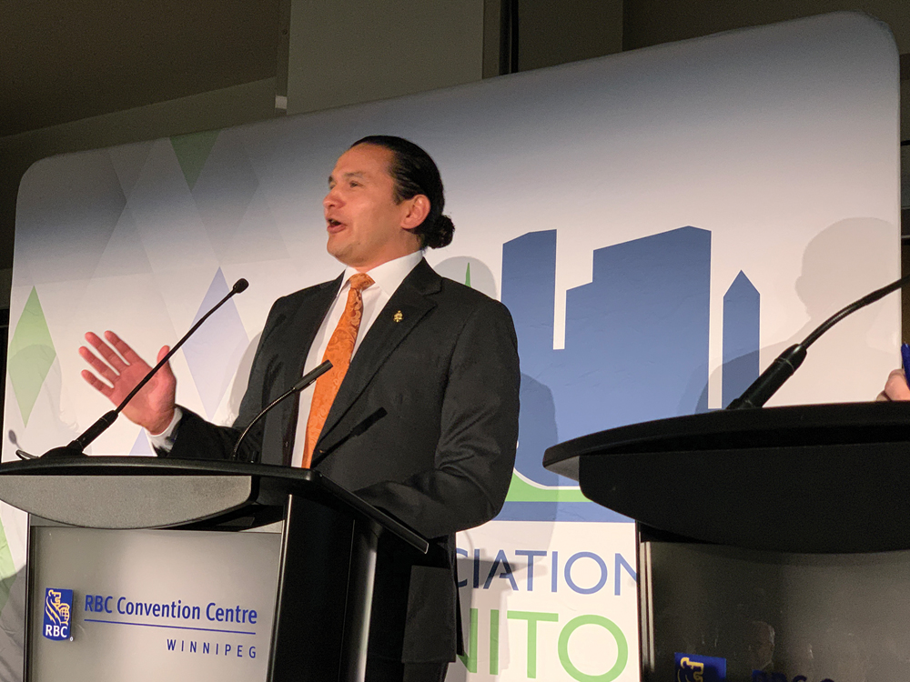 Wab Kinew, premier-designate after his party’s Oct. 3 victory, speaks at the Association of Manitoba Municipalities leaders’ debate in April.