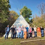 Stewards of Wabano Aki at the ceremonial grounds: (L-R) Ken Norquay, Fayaz Hasan, Jeremy Hogan, Kevin Teneycke, Gordon Beddome, Midge Stace, Cary Hamel, Rebekah Neufeld, Christine Chilton, Josh Dillabough, Wendy Norquay, Lauren James and Karine Whitcher.