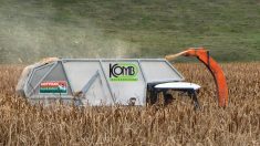 Marlon Bergen demonstrates his tracked wetlands harvester at the Redboine Watershed District’s Pelly’s Lake Project.