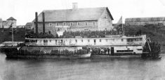 Mennonites disembark from a steamboat in in Manitoba in 1874.