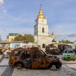A display of civilian vehicles destroyed in the war in Kyiv.