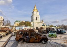 A display of civilian vehicles destroyed in the war in Kyiv.