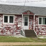 A house in Oak River had its siding shredded during an early-season thunderstorm.