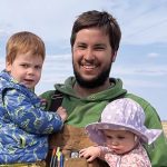 Carman-area farmer Tyler Menold with his kids.