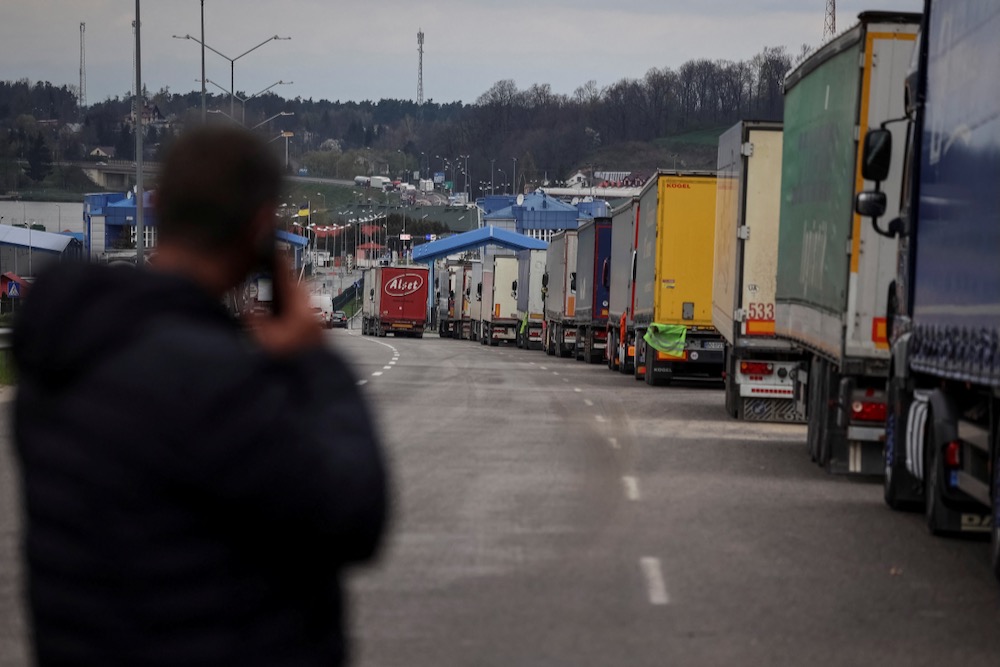 Trucks wait for crossing into Poland at the Rava-Ruska border checkpoint in Ukraine’s Lviv region on April 17, 2023. (Photo: Reuters/Roman Baluk)
