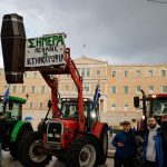 Greek farmers, with their tractors, protest in front of the Greek parliament over rising energy costs and competition from imports in Athens, Greece, February 20, 2024. REUTERS/Louisa Gouliamaki